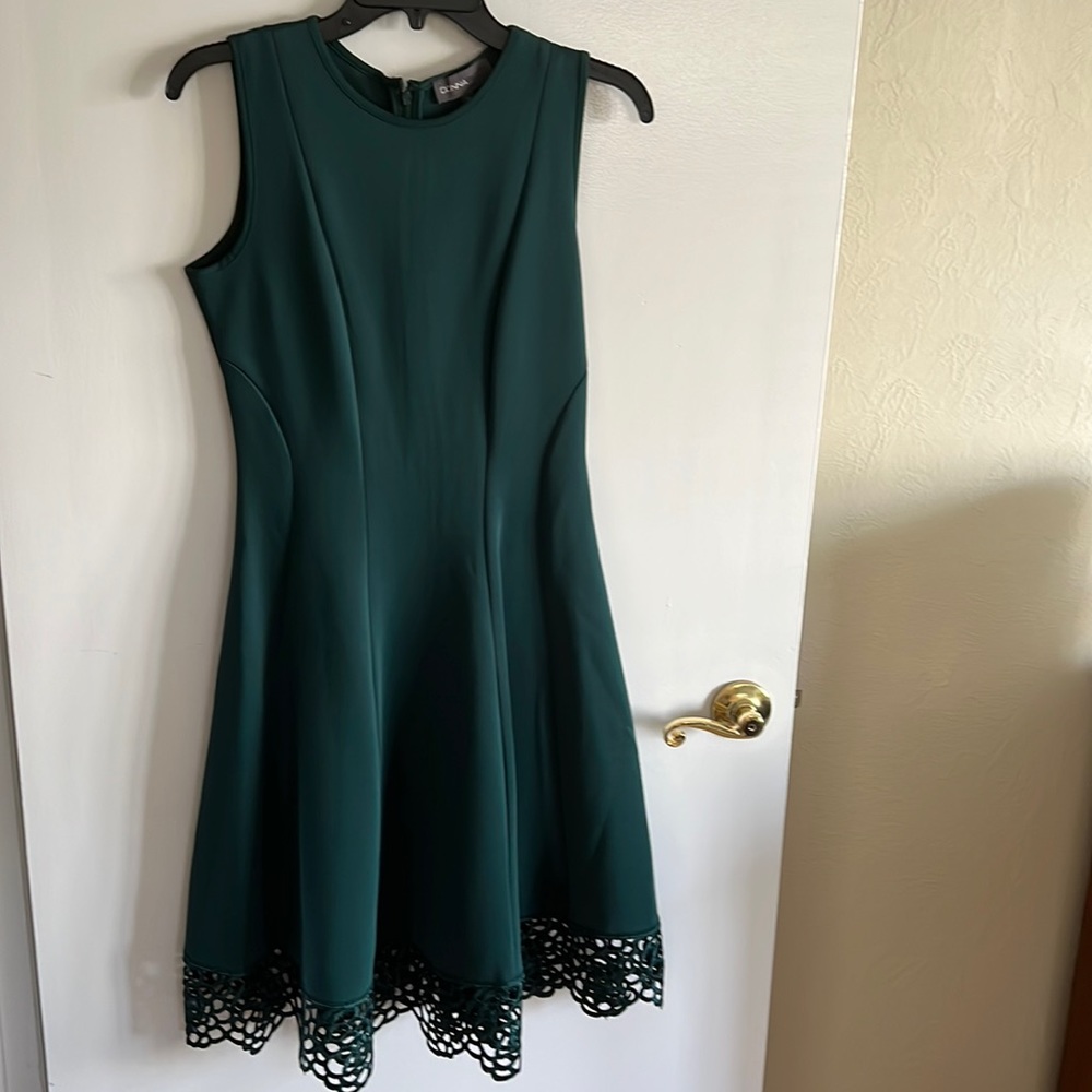 Deep green size 6 fit and flare dress with Cutout lace by Donna Ricco